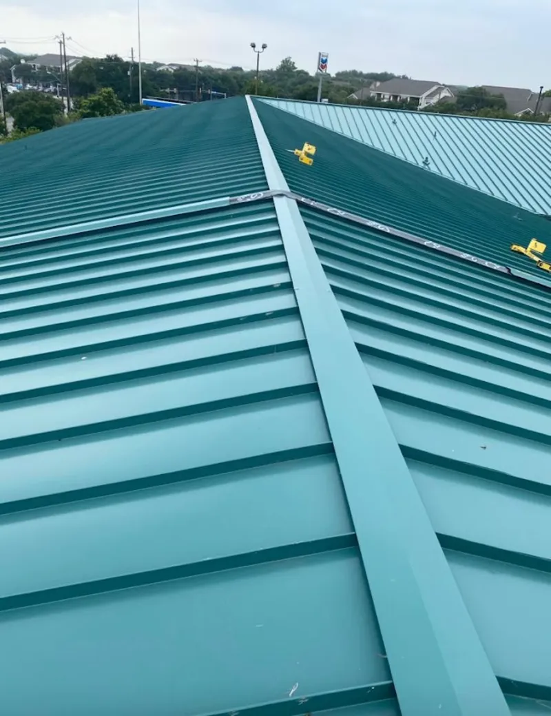 Green commercial metal roof ridge and valley for Metal Roof Repair in Clarkdale