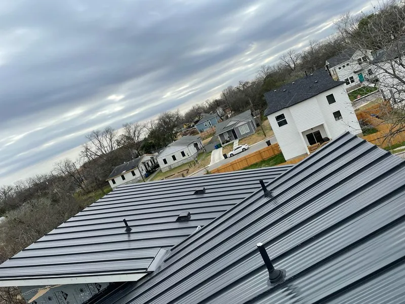 Standing seam metal roof panels with vents for Skylight Repair in Clarkdale